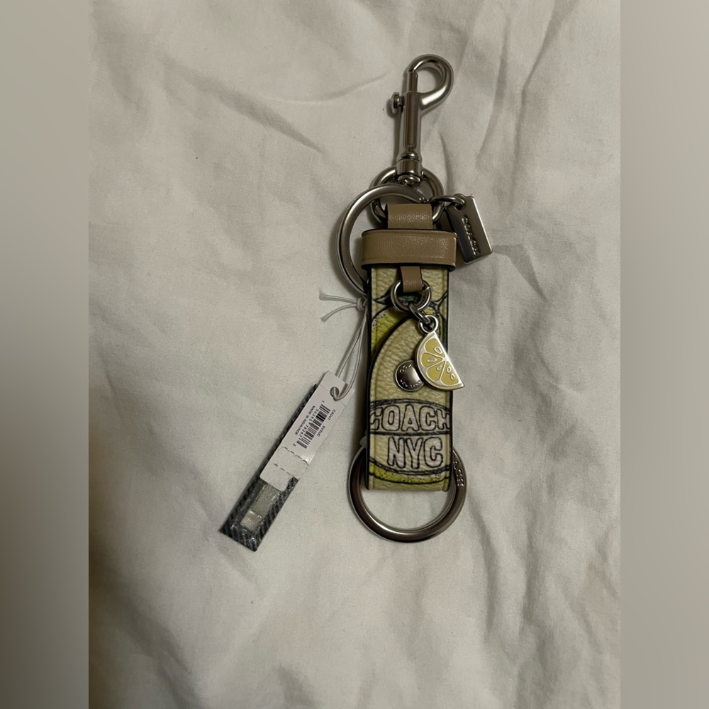 Coach lemon 🍋 trigger snap bag charm